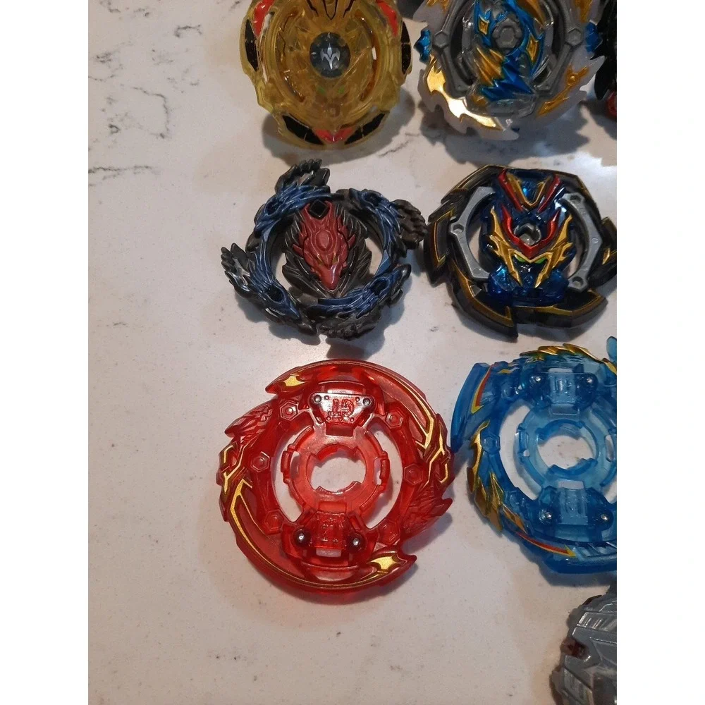 Lot Of 8 Beyblade And Different Parts